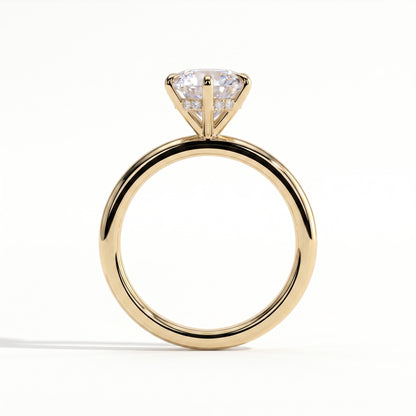 Round lab-grown diamond solitaire engagement ring in 14K (585) yellow gold, side profile 
