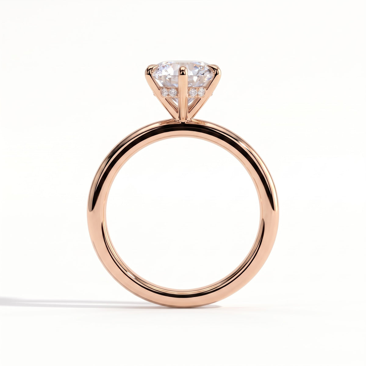 Round lab-grown diamond solitaire engagement ring in 14K (585) rose gold, side profile 
