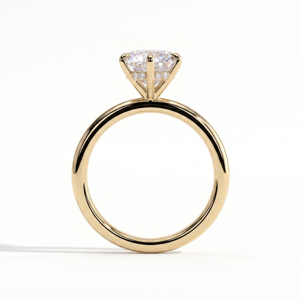 Round lab-grown diamond solitaire engagement ring in 18K (750) yellow gold, side profile 