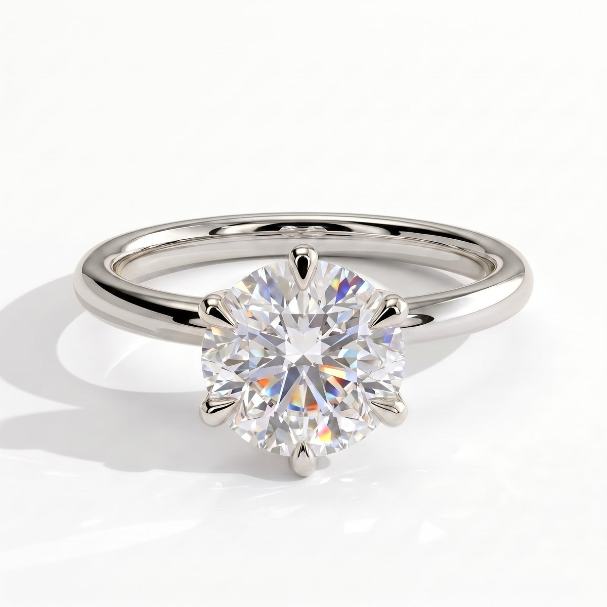 Round lab-grown diamond solitaire engagement ring in 950 platinum, front view 