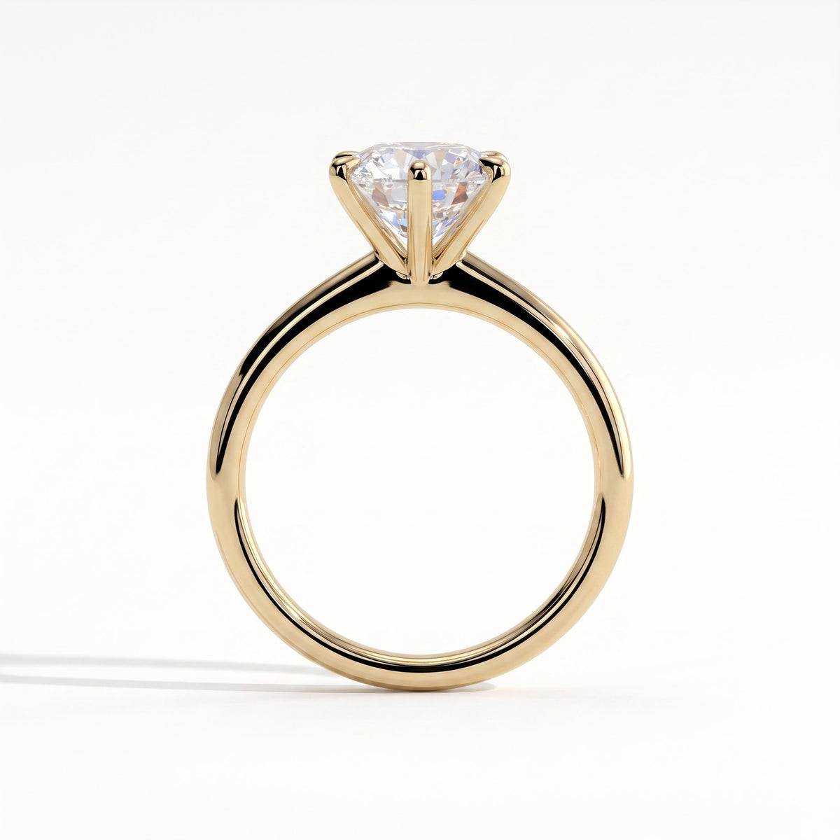 Round lab-grown diamond halo engagement ring in 14K (585) yellow gold, side profile 