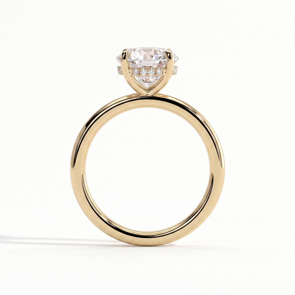 Round lab-grown diamond solitaire engagement ring in 14K (585) yellow gold, side profile 