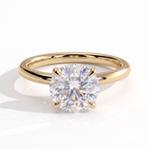 Round lab-grown diamond solitaire engagement ring in 14K (585) yellow gold, front view 
