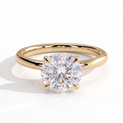 Round lab-grown diamond solitaire engagement ring in 14K (585) yellow gold, front view 