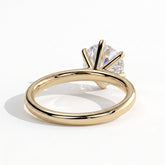 Round lab-grown diamond halo engagement ring in 18K (750) yellow gold, on white background 