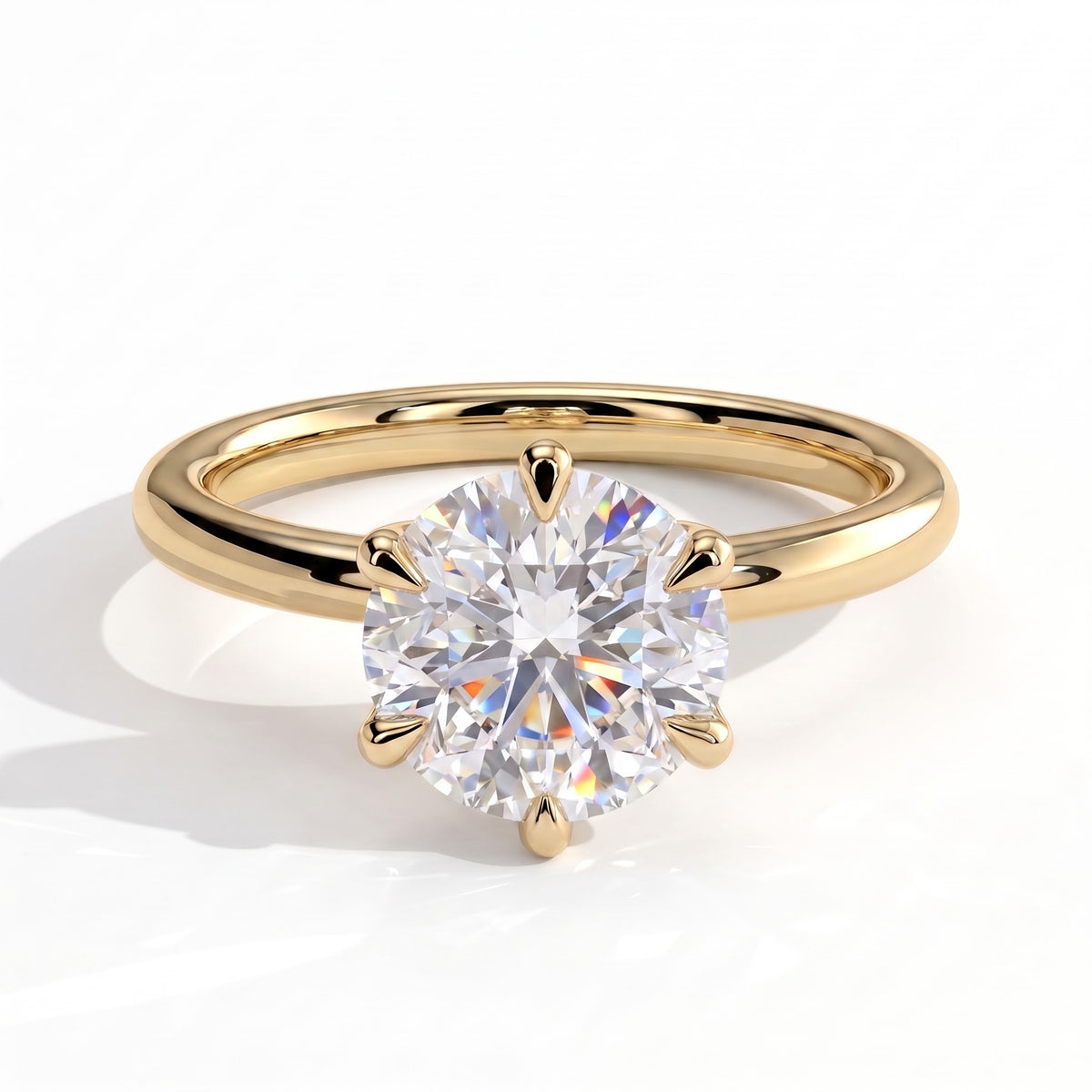 Round lab-grown diamond halo engagement ring in 18K (750) yellow gold, front view 