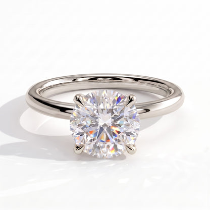 Round lab-grown diamond solitaire engagement ring in 18K (750) white gold, front view 