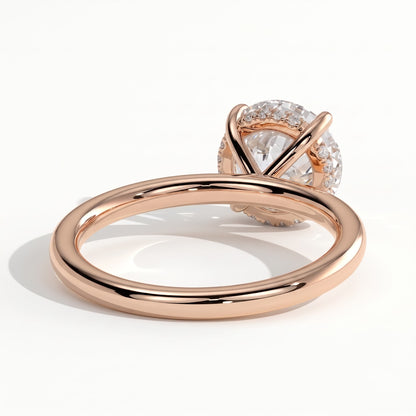 Round lab-grown diamond solitaire engagement ring in 18K (750) rose gold, on white background 