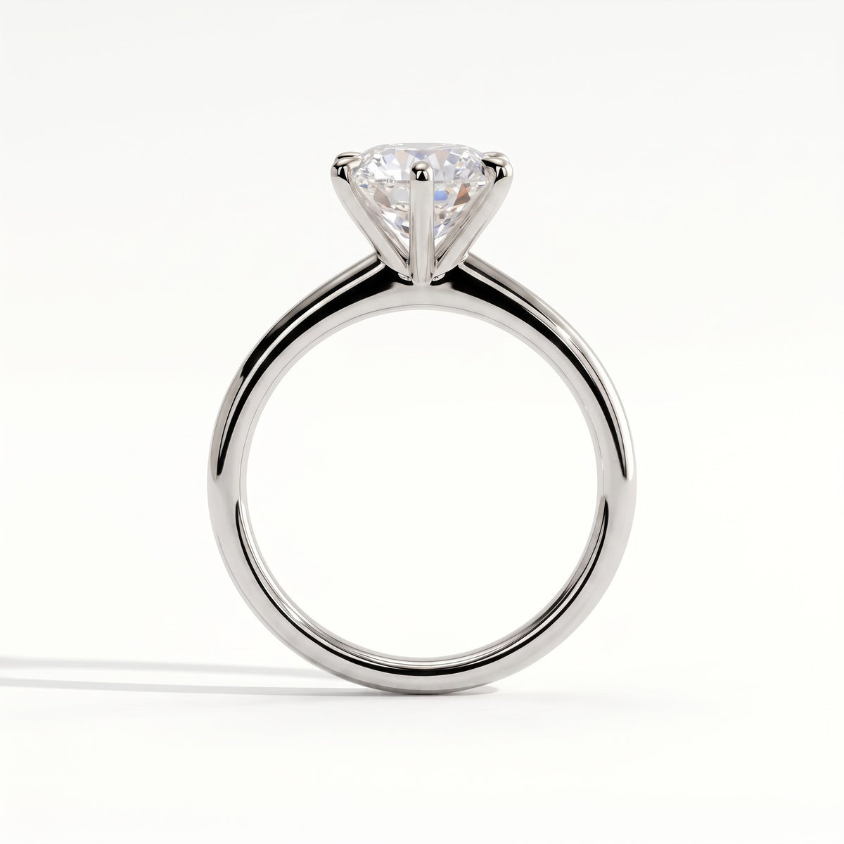 Round lab-grown diamond halo engagement ring in 950 platinum, side profile 
