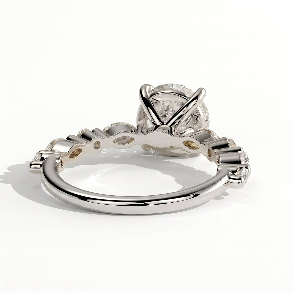 Round lab-grown diamond halo engagement ring in 950 platinum, on white background 