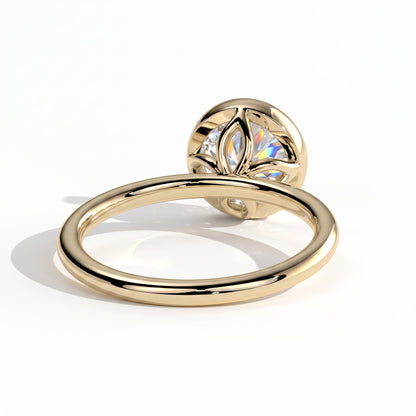 Round lab-grown diamond bezel-set solitaire engagement ring in 14K (585) yellow gold, on white background 