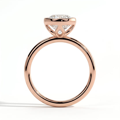 Round lab-grown diamond bezel-set solitaire engagement ring in 14K (585) rose gold, side profile 
