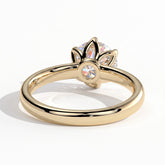 Round lab-grown diamond solitaire engagement ring in 14K (585) yellow gold, on white background 