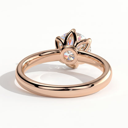 Round lab-grown diamond solitaire engagement ring in 14K (585) rose gold, on white background 