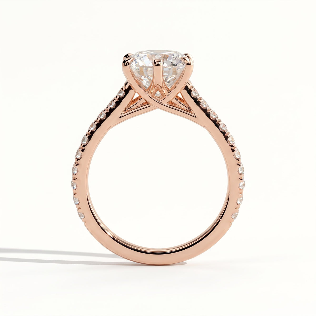 Round lab-grown diamond halo engagement ring in 14K (585) rose gold, side profile 