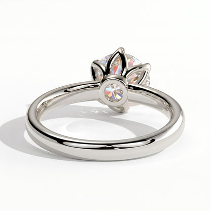 Round lab-grown diamond solitaire engagement ring in 950 platinum, on white background 