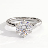 Round lab-grown diamond solitaire engagement ring in 950 platinum, front view 