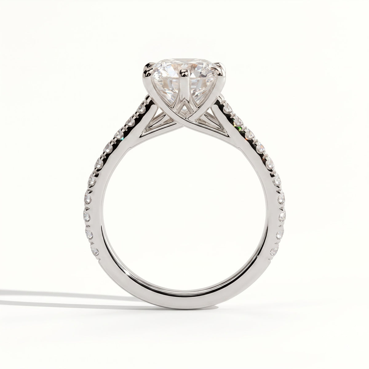 Round lab-grown diamond halo engagement ring in 950 platinum, side profile 