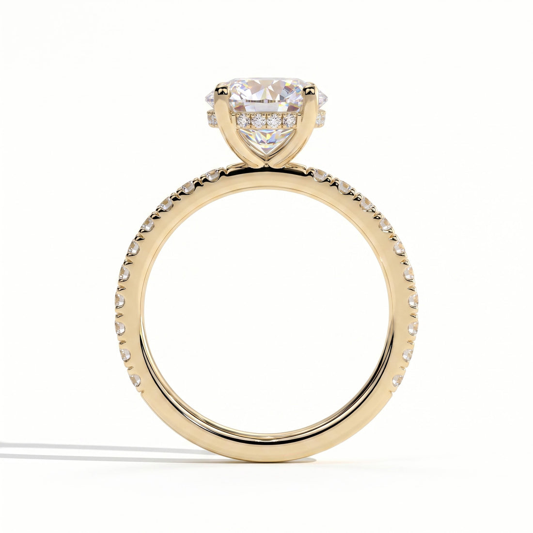 Round lab-grown diamond halo engagement ring in 14K (585) yellow gold, side profile 