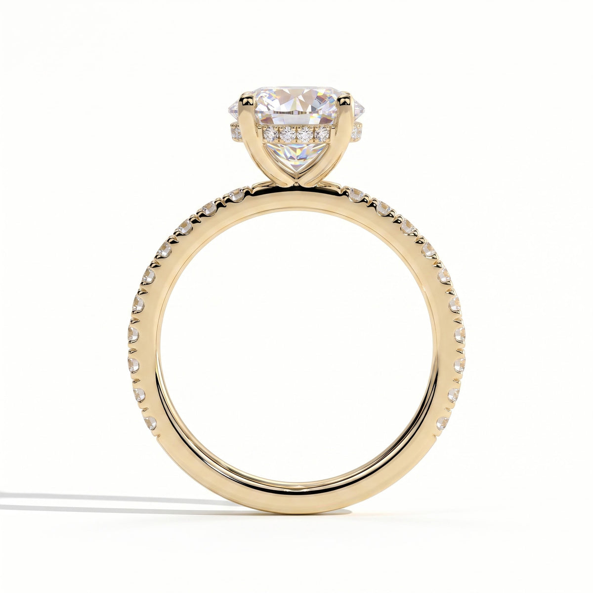 Round lab-grown diamond halo engagement ring in 14K (585) yellow gold, side profile 
