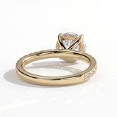 Round lab-grown diamond halo engagement ring in 14K (585) yellow gold, on white background 