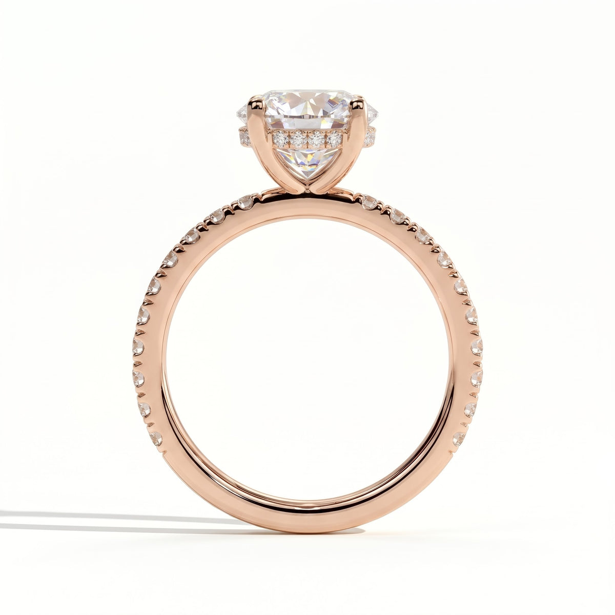 Round lab-grown diamond halo engagement ring in 18K (750) rose gold, side profile 