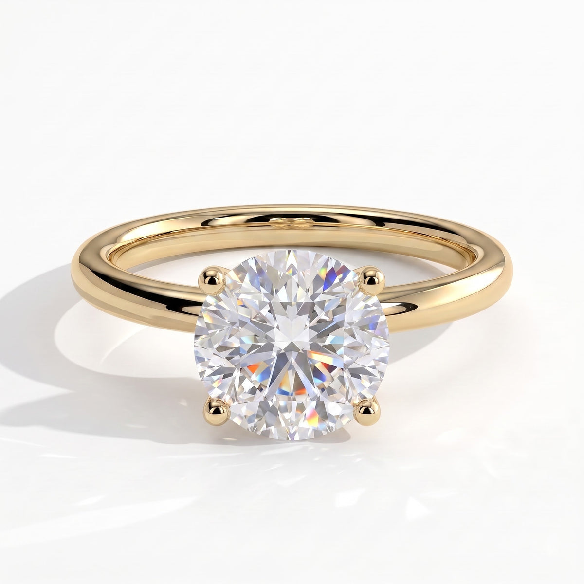 Round lab-grown diamond halo engagement ring in 18K (750) yellow gold, front view 