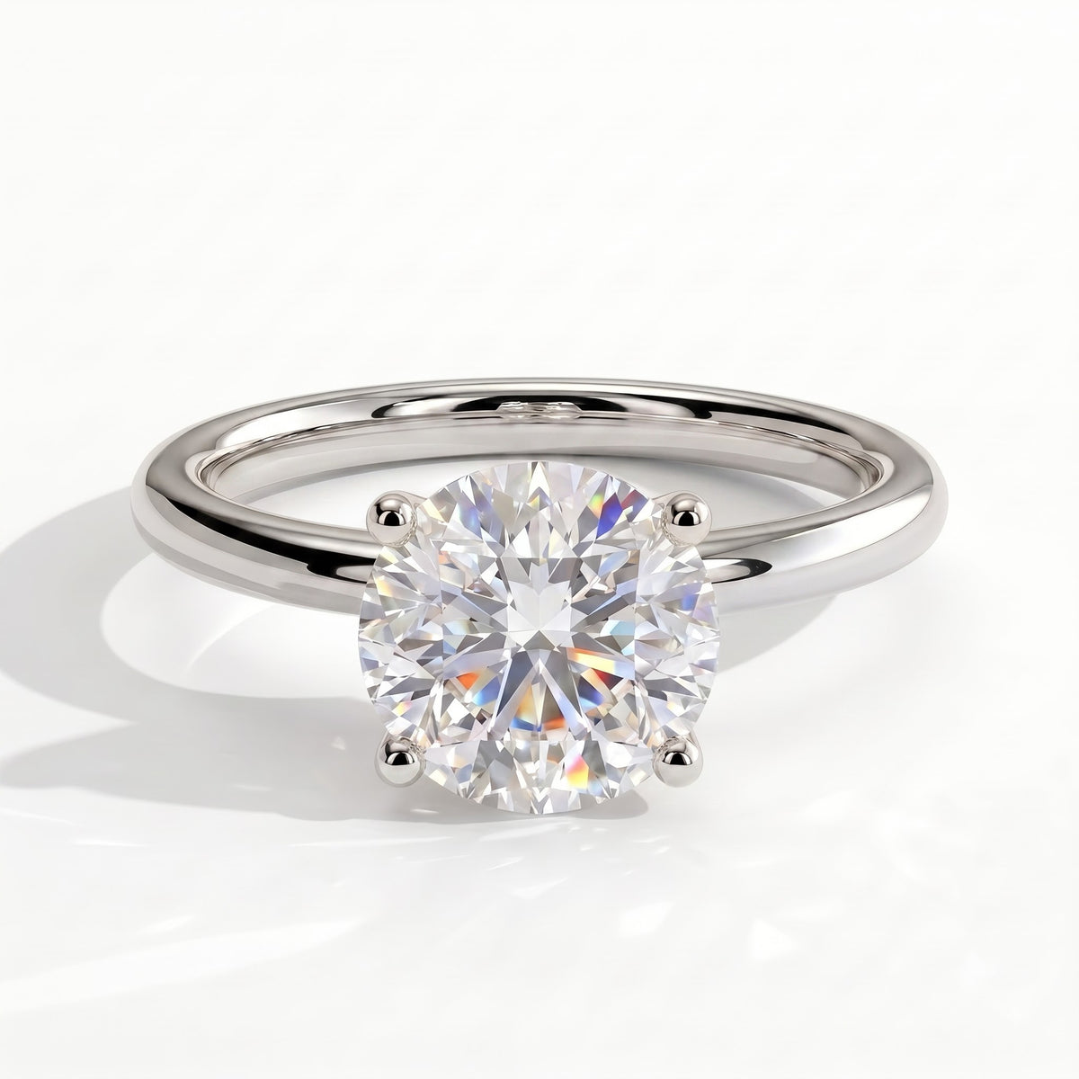 Round lab-grown diamond halo engagement ring in 18K (750) white gold, front view 