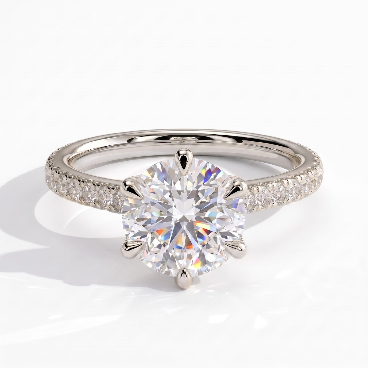 Round lab-grown diamond halo engagement ring in 950 platinum, front view 