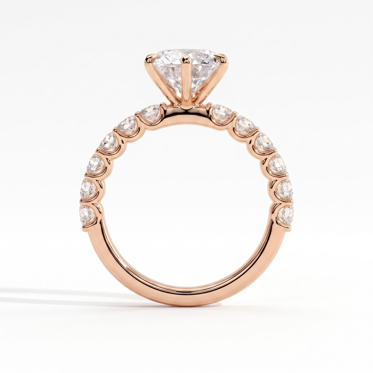 Round lab-grown diamond halo engagement ring in 14K (585) rose gold, side profile 