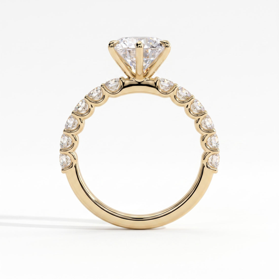 Round lab-grown diamond halo engagement ring in 14K (585) yellow gold, side profile 