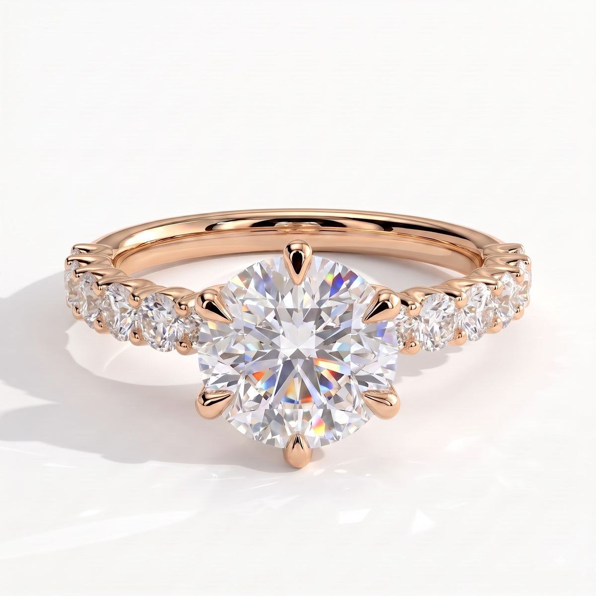 Round lab-grown diamond halo engagement ring in 14K (585) rose gold, front view 