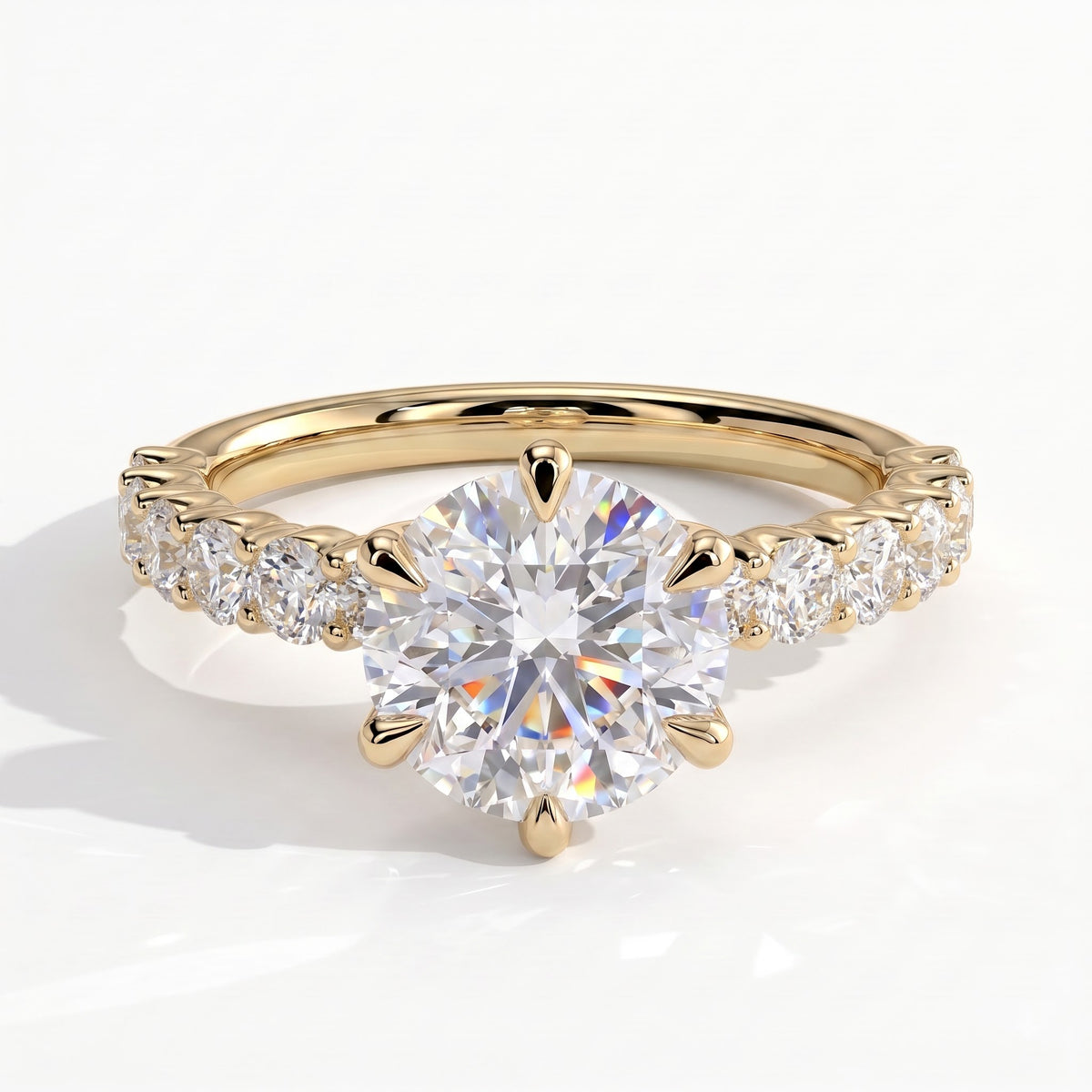 Round lab-grown diamond halo engagement ring in 18K (750) yellow gold, front view 