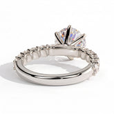 Round lab-grown diamond halo engagement ring in 950 platinum, on white background 