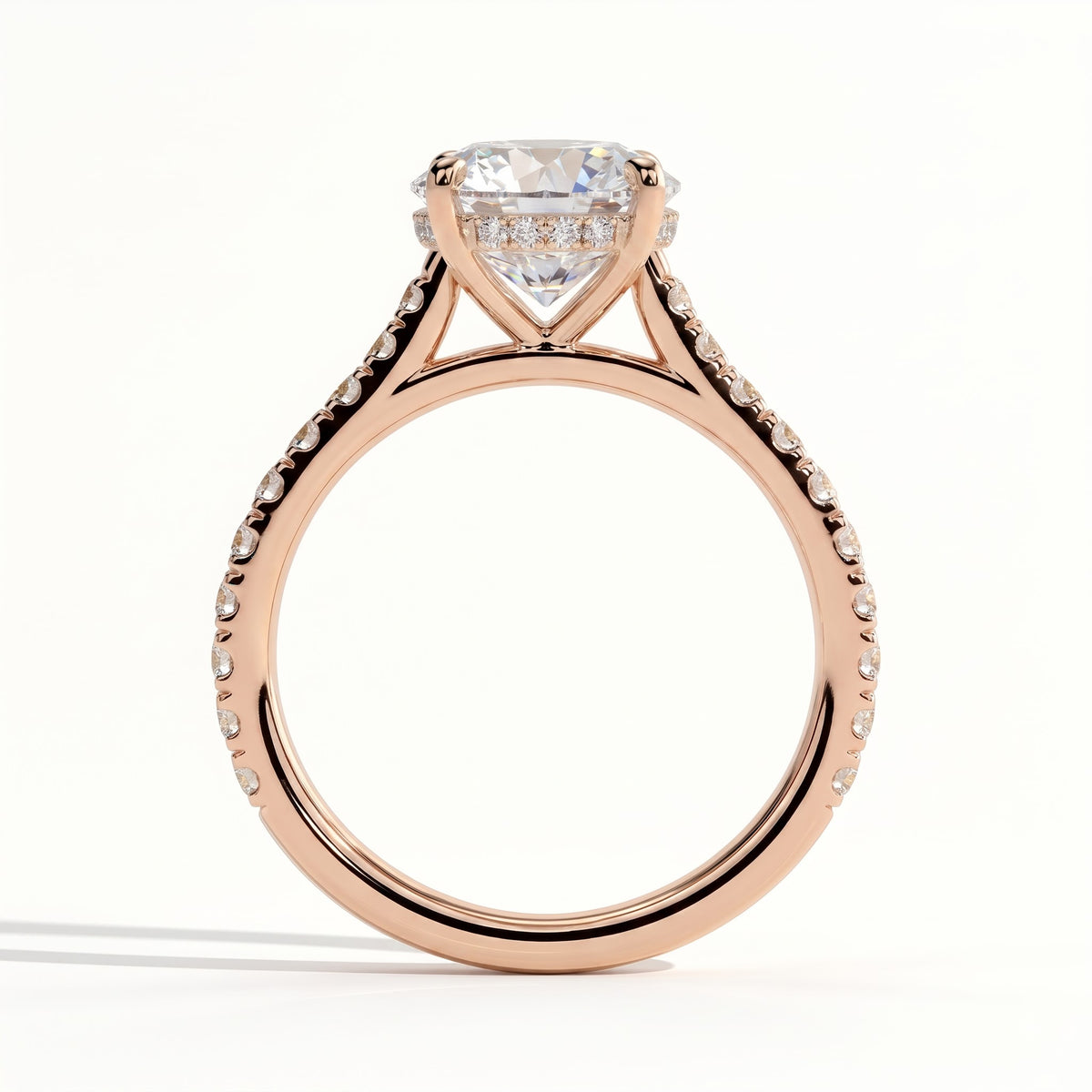Round lab-grown diamond halo engagement ring in 14K (585) rose gold, side profile 