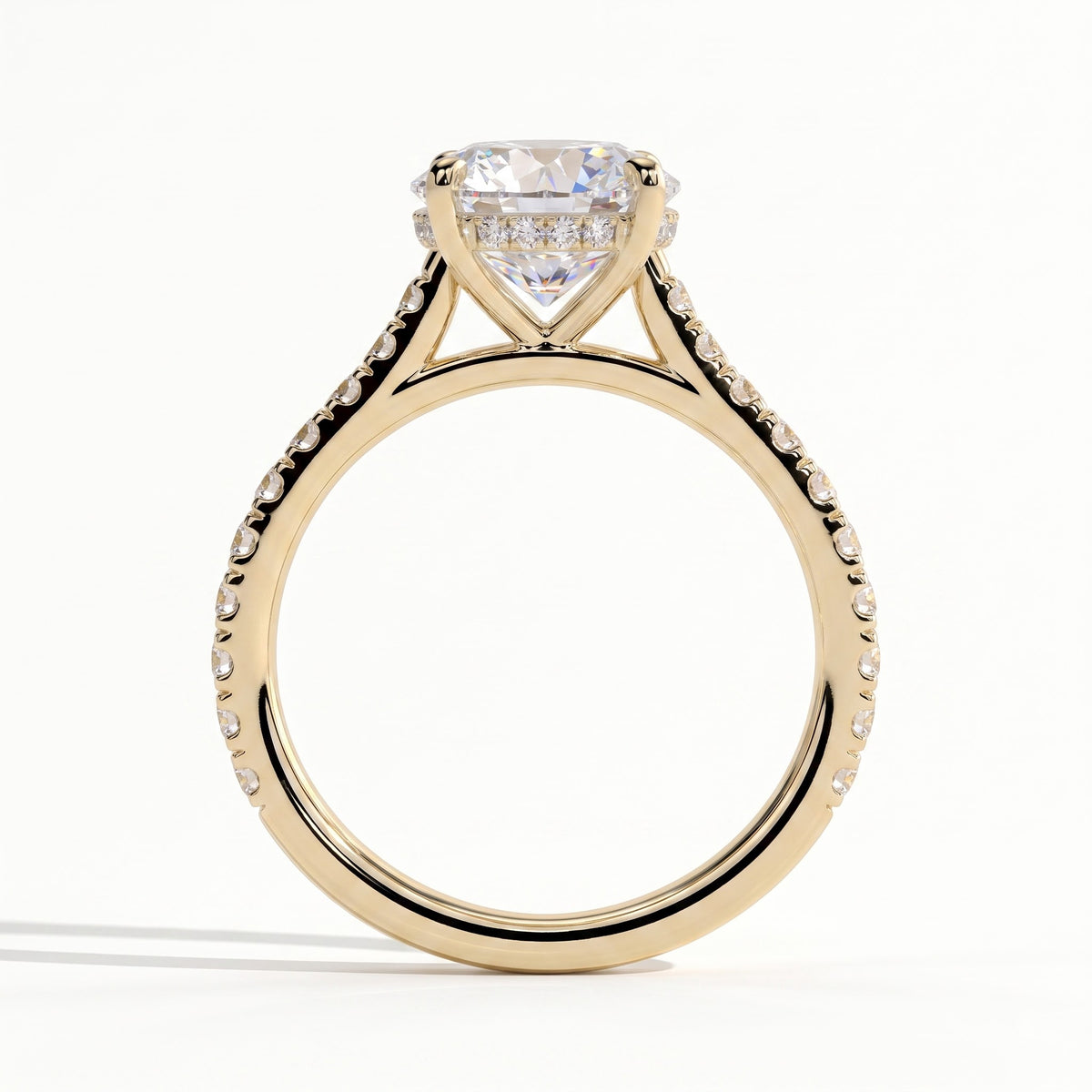 Round lab-grown diamond halo engagement ring in 14K (585) yellow gold, side profile 