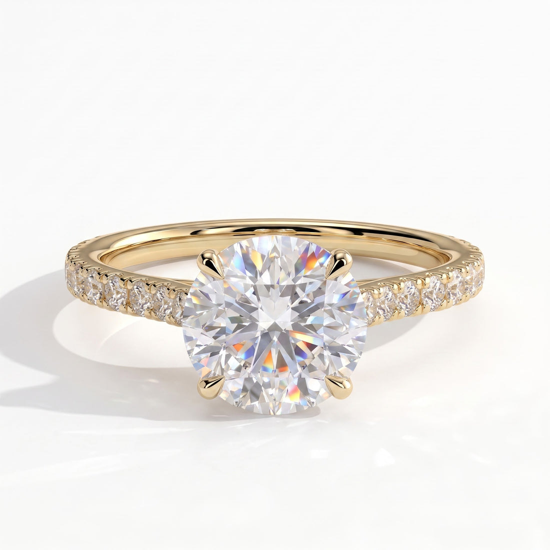 Round lab-grown diamond halo engagement ring in 14K (585) yellow gold, front view 