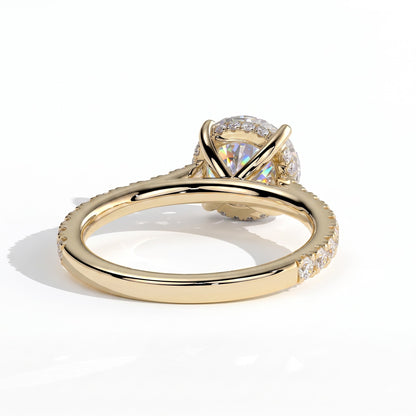 Round lab-grown diamond halo engagement ring in 14K (585) yellow gold, on white background 