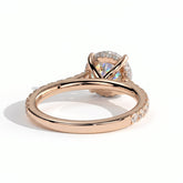 Round lab-grown diamond halo engagement ring in 14K (585) rose gold, on white background 