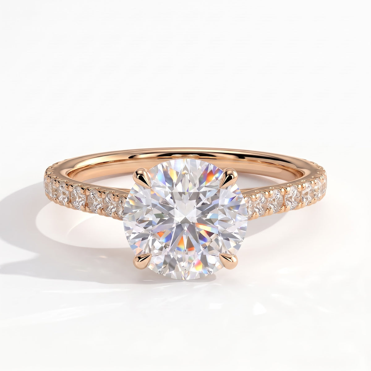 Round lab-grown diamond halo engagement ring in 14K (585) rose gold, front view 