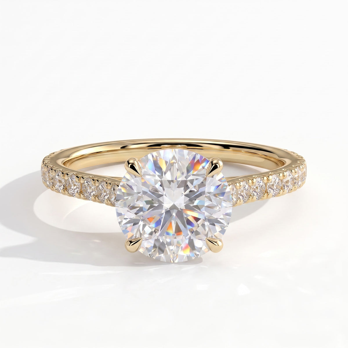 Round lab-grown diamond halo engagement ring in 18K (750) yellow gold, front view 