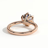 Round lab-grown diamond solitaire engagement ring in 14K (585) rose gold, on white background 