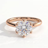 Round lab-grown diamond solitaire engagement ring in 14K (585) rose gold, front view 