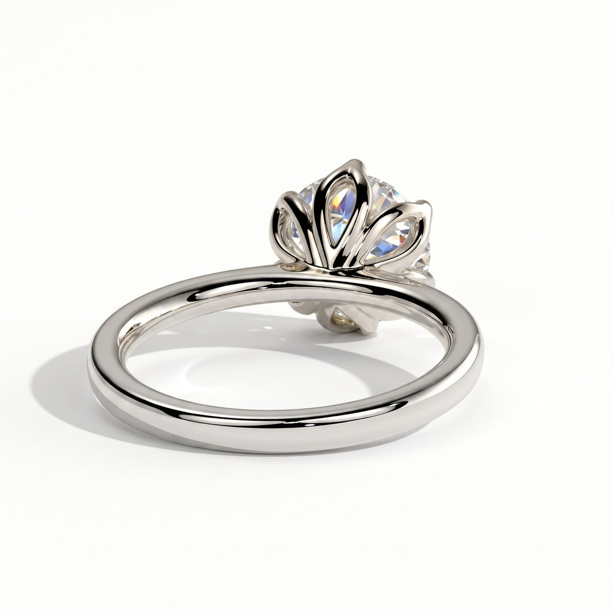 Round lab-grown diamond solitaire engagement ring in 14K (585) white gold, on white background 