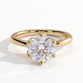 Round lab-grown diamond solitaire engagement ring in 14K (585) yellow gold, front view 