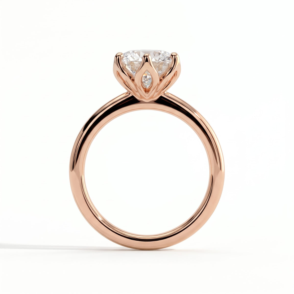 Round lab-grown diamond solitaire engagement ring in 18K (750) rose gold, side profile 
