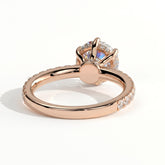 Round lab-grown diamond halo engagement ring in 14K (585) rose gold, on white background 