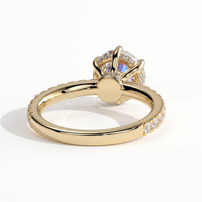 Round lab-grown diamond halo engagement ring in 18K (750) yellow gold, on white background 