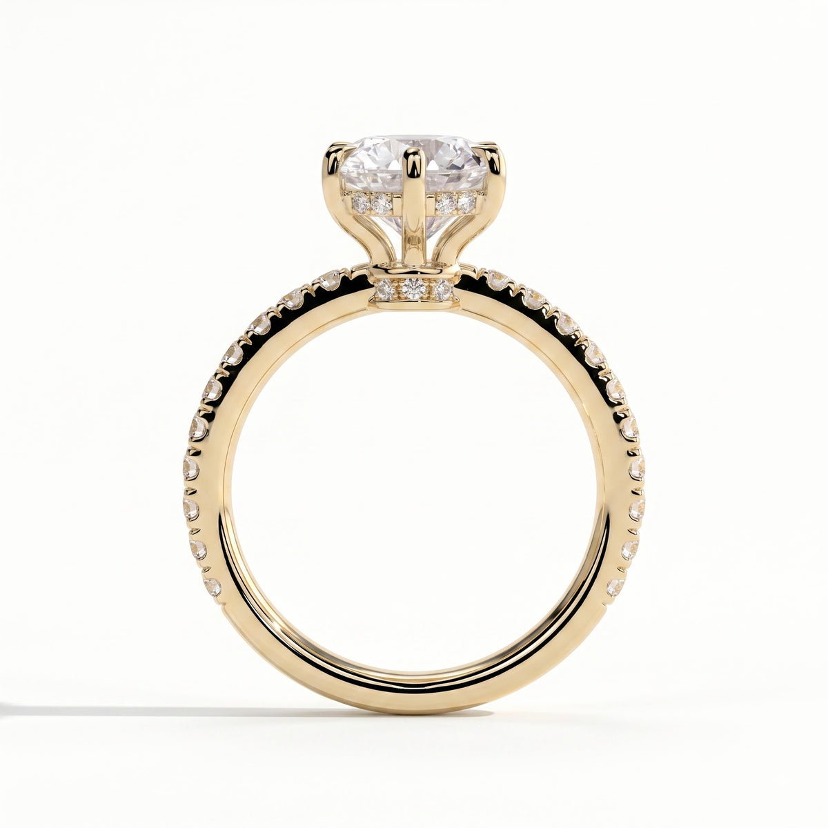 Round lab-grown diamond halo engagement ring in 18K (750) yellow gold, side profile 