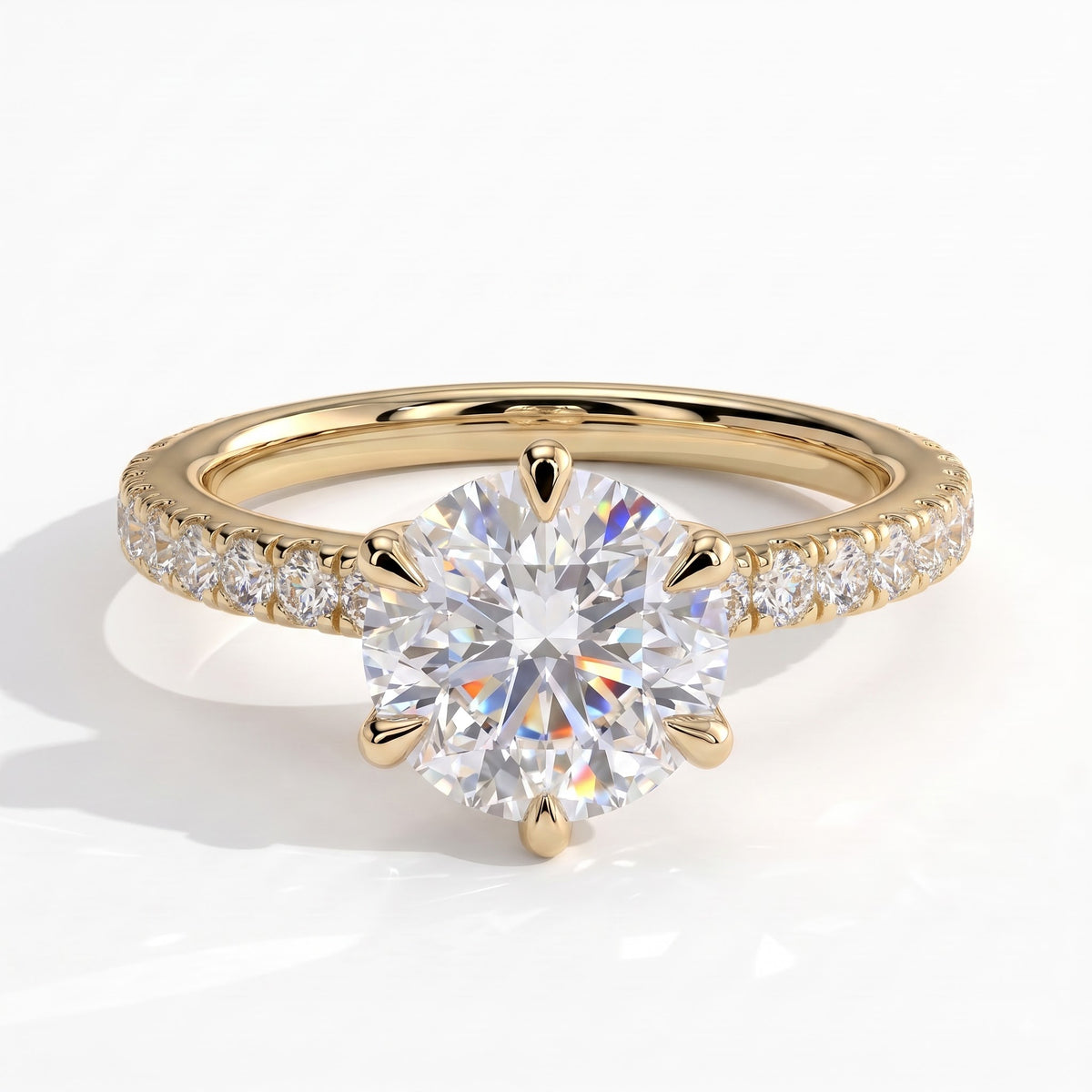 Round lab-grown diamond halo engagement ring in 14K (585) yellow gold, front view 